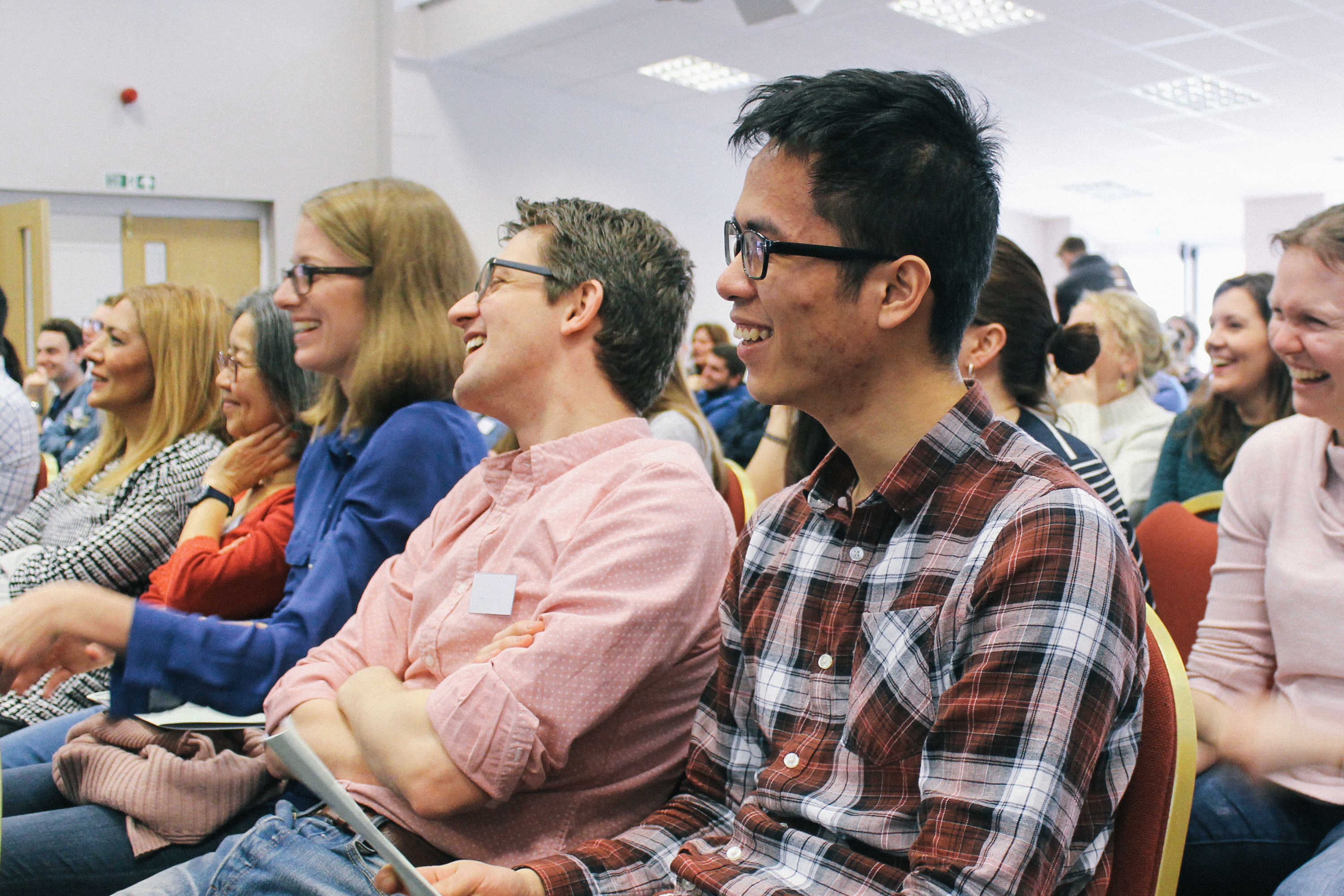 People smiling at a church weekend away